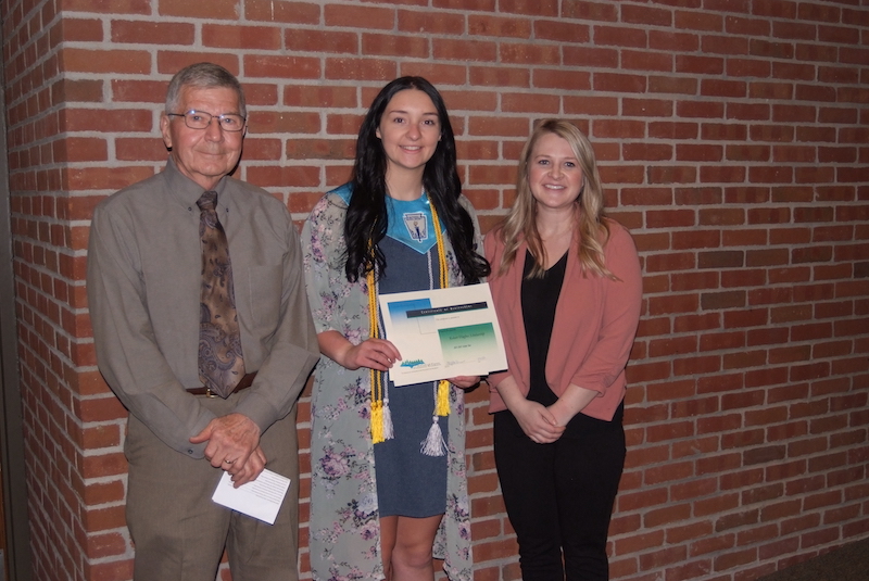 There were 15 applicants for the $500 Hughes Scholarship. The scholarship gives preference to Gulliver residents, and one applicant who met all the criteria is also from the Gulliver area. The scholarship was awarded by Rick Wodzinski, SCCF Grant Committee chairman, and Alyssa Swanson, SCCF president, (right) to Alyssa Ecclesine (center) who plans to attend Bay de Noc Community College to study nursing radiology.